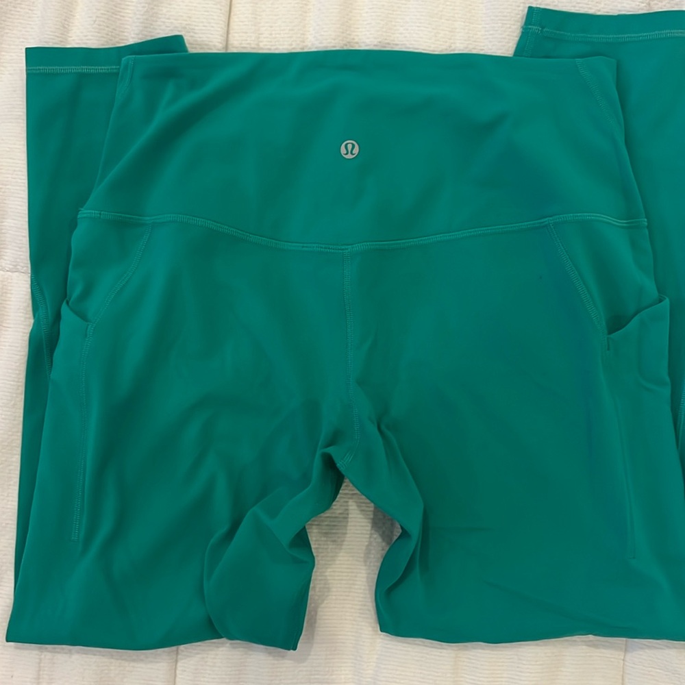 Teal align lululemon leggings with pockets. Great condition. Worn once.